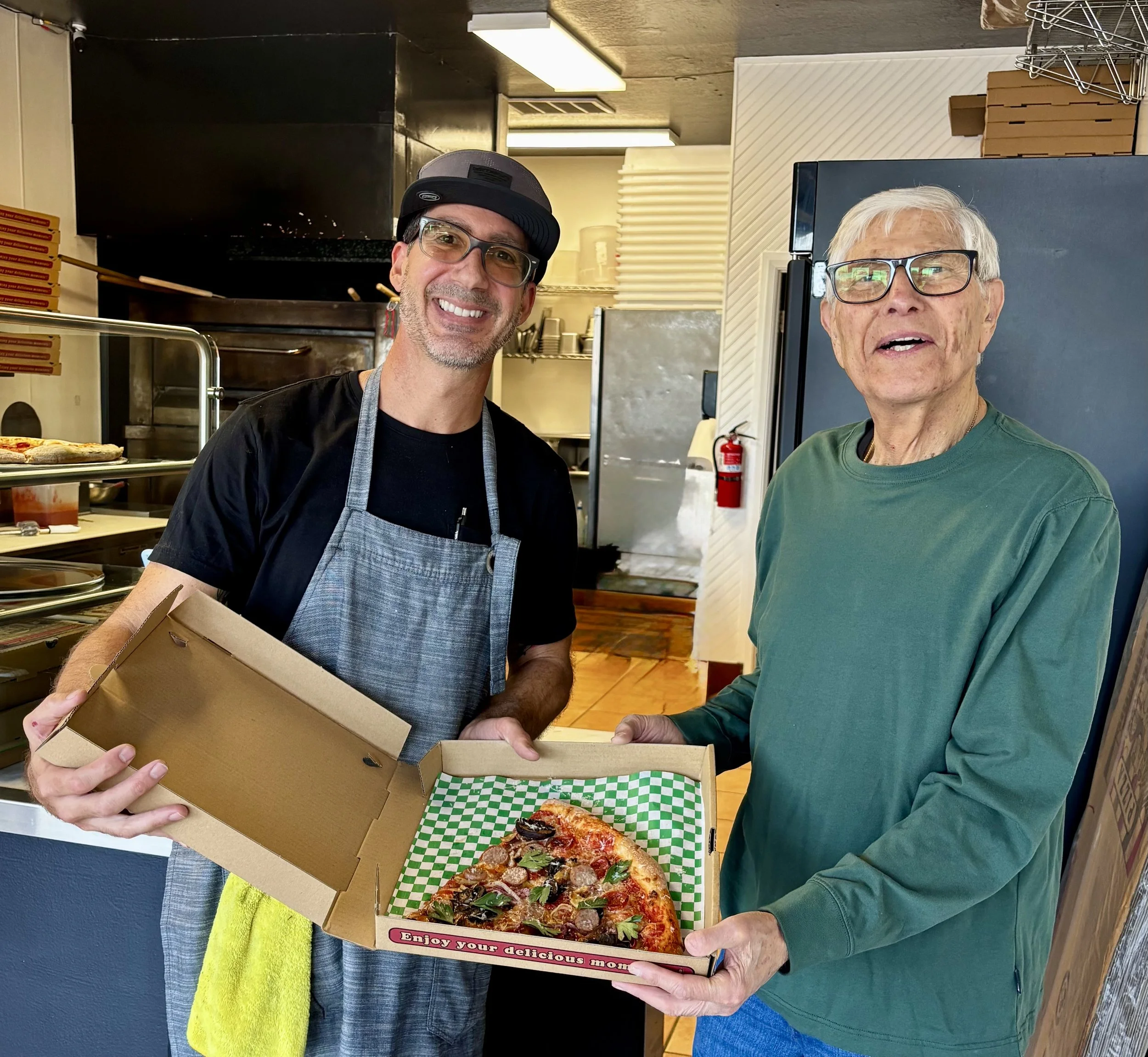 Family legacy pizza slice shop in local town