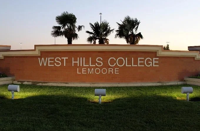 Sign on a brick wall for West Hills College Lemoore