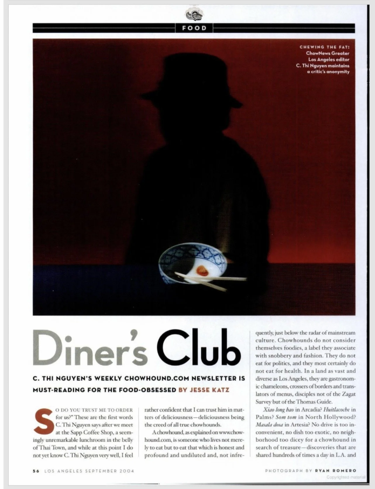 A silhouette of a person wearing a hat behind a table with a small bowl of sauce and chopsticks, set against a red background.