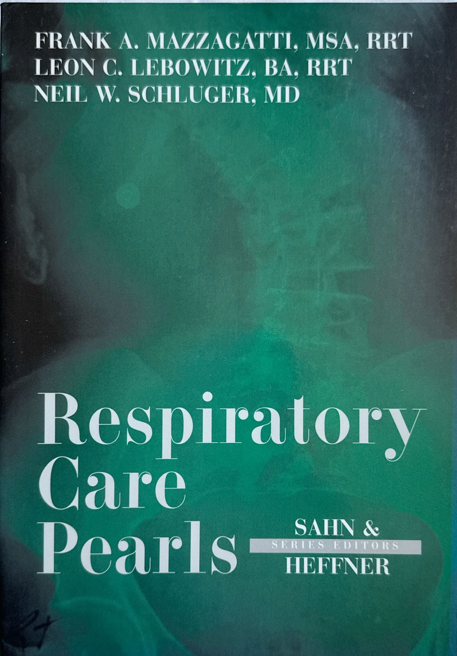 Close-up of a book cover titled 'Respiratory Care Pearls' by authors Frank A. Mazzagatti, Leon C. Lebowitz, Neil W. Schluger, MD, published by Heffner Series Editors.