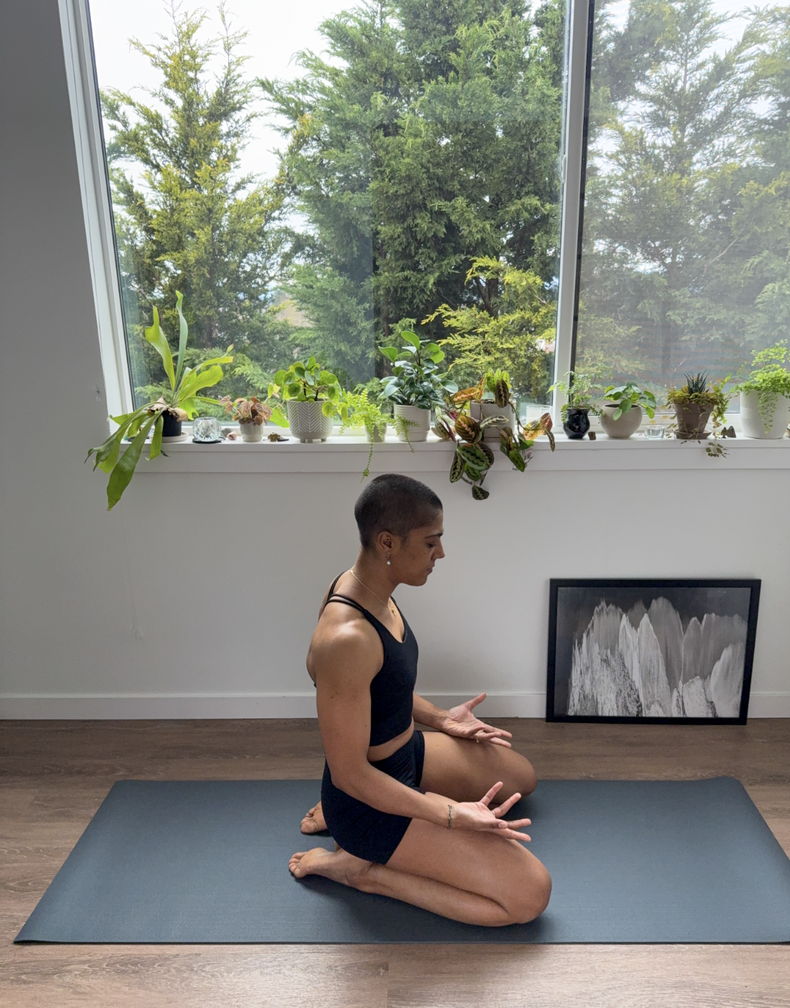 Portrait of somatic yoga and Pilates teacher Charla Chatman representing her honest trauma-informed approach to grief, healing, and body reconnection