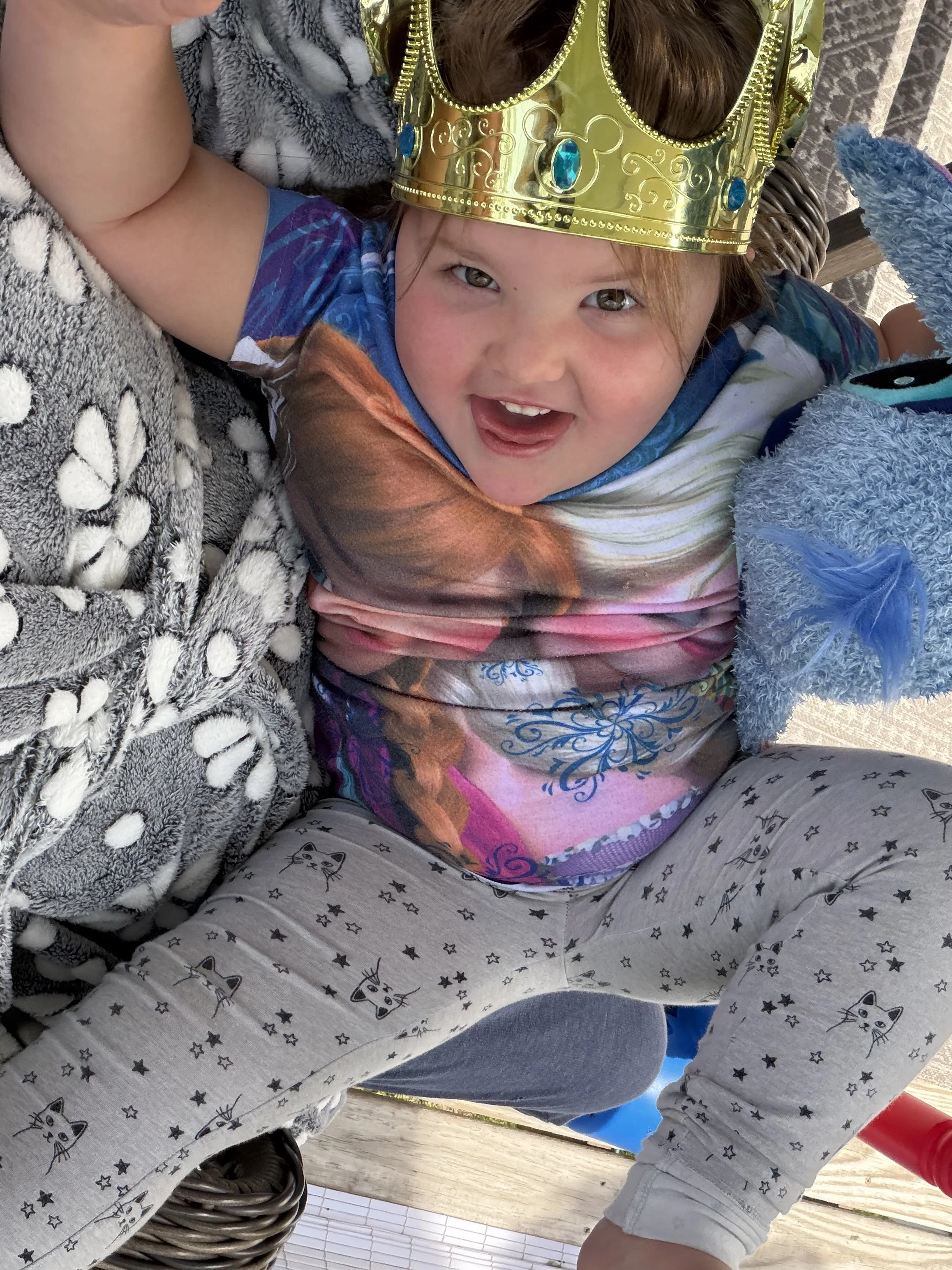Bella Grace smiling while wearing her Mickey Mouse Crown she got from Disney on Ice, capturing her joyful imagination, confidence, and the childlike wonder that continue to inspire the Believe Like Bella ministry.