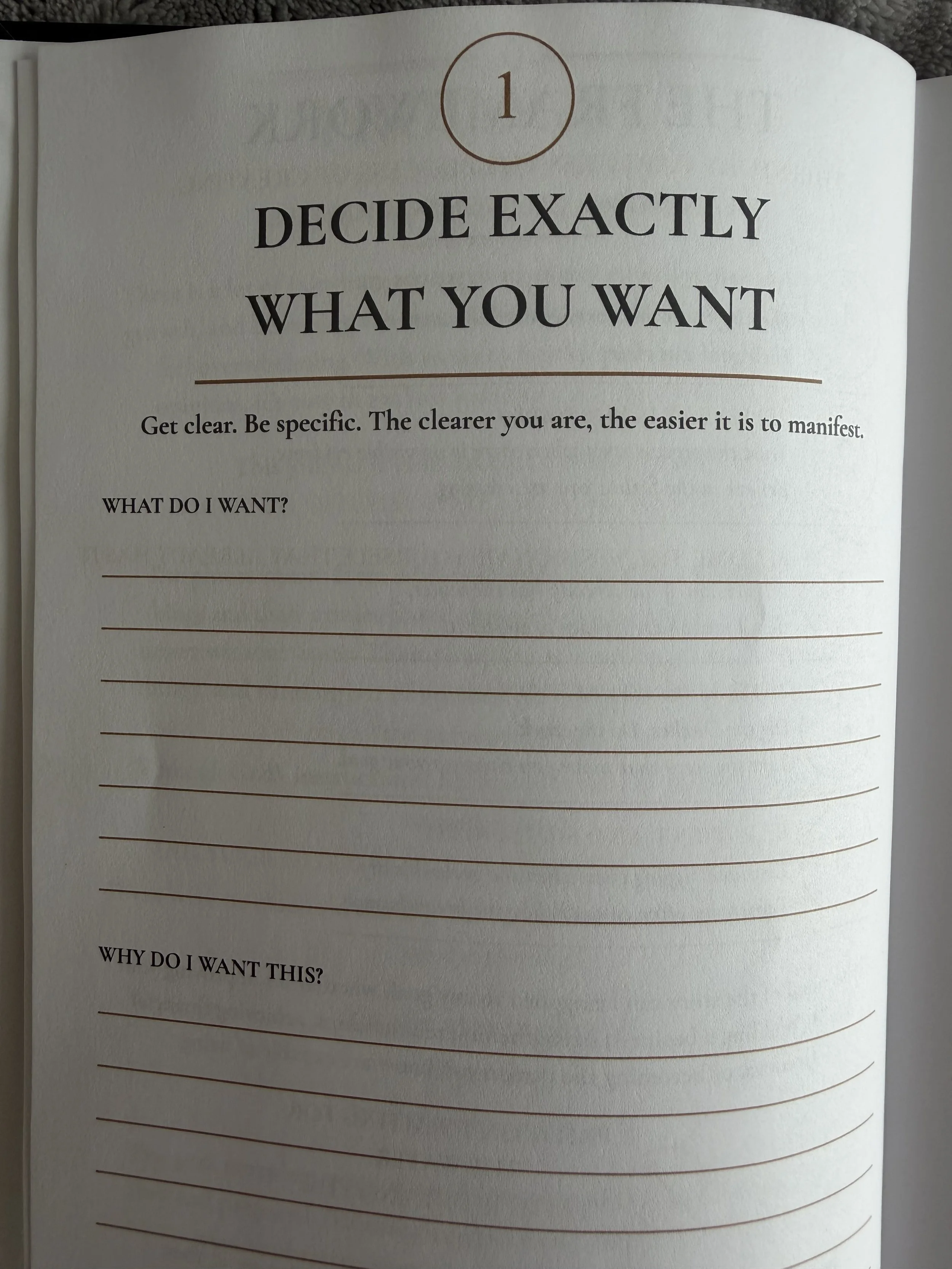 Open journal page with title 'Decide exactly what you want' and a prompt to clarify goals and be specific.