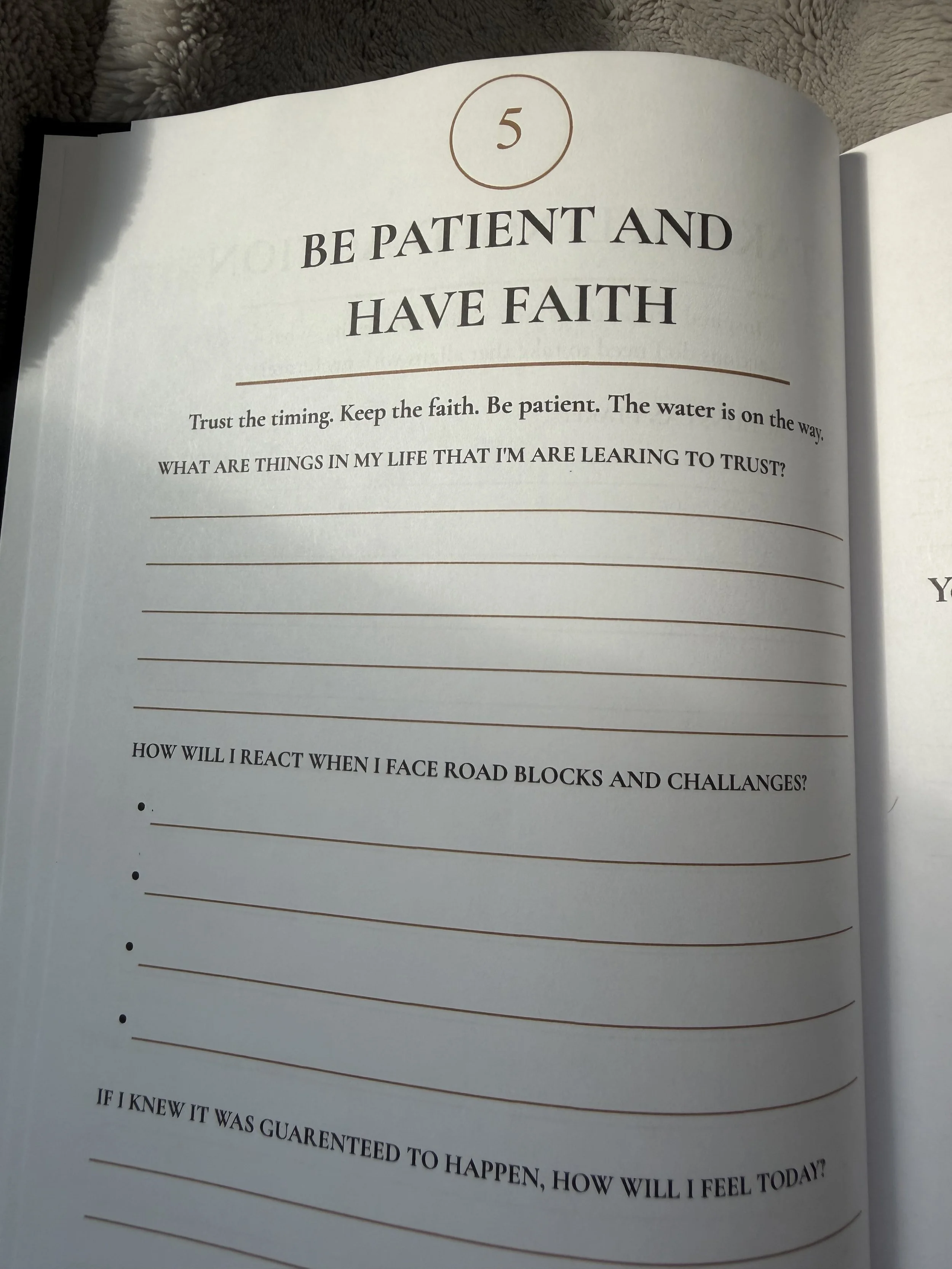 Open journal or notebook page with the number 5 inside a circle and a motivational quote about patience and faith.
