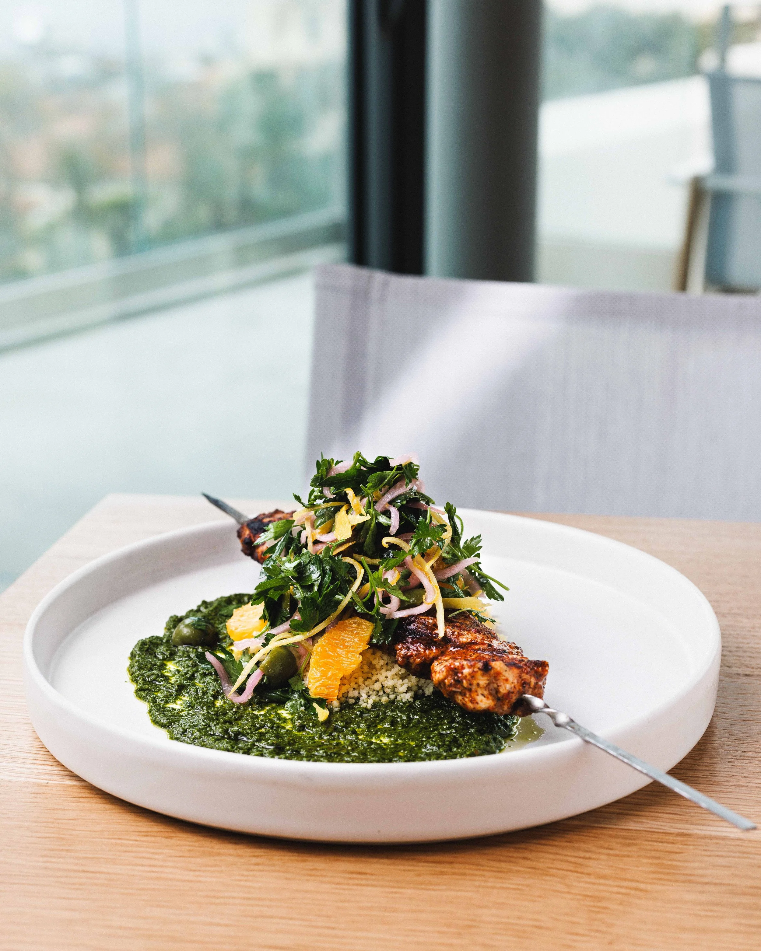 Commercial food photo of chicken skewers in at the Kitchen at the Museum of Contemporary Art in San Diego.
