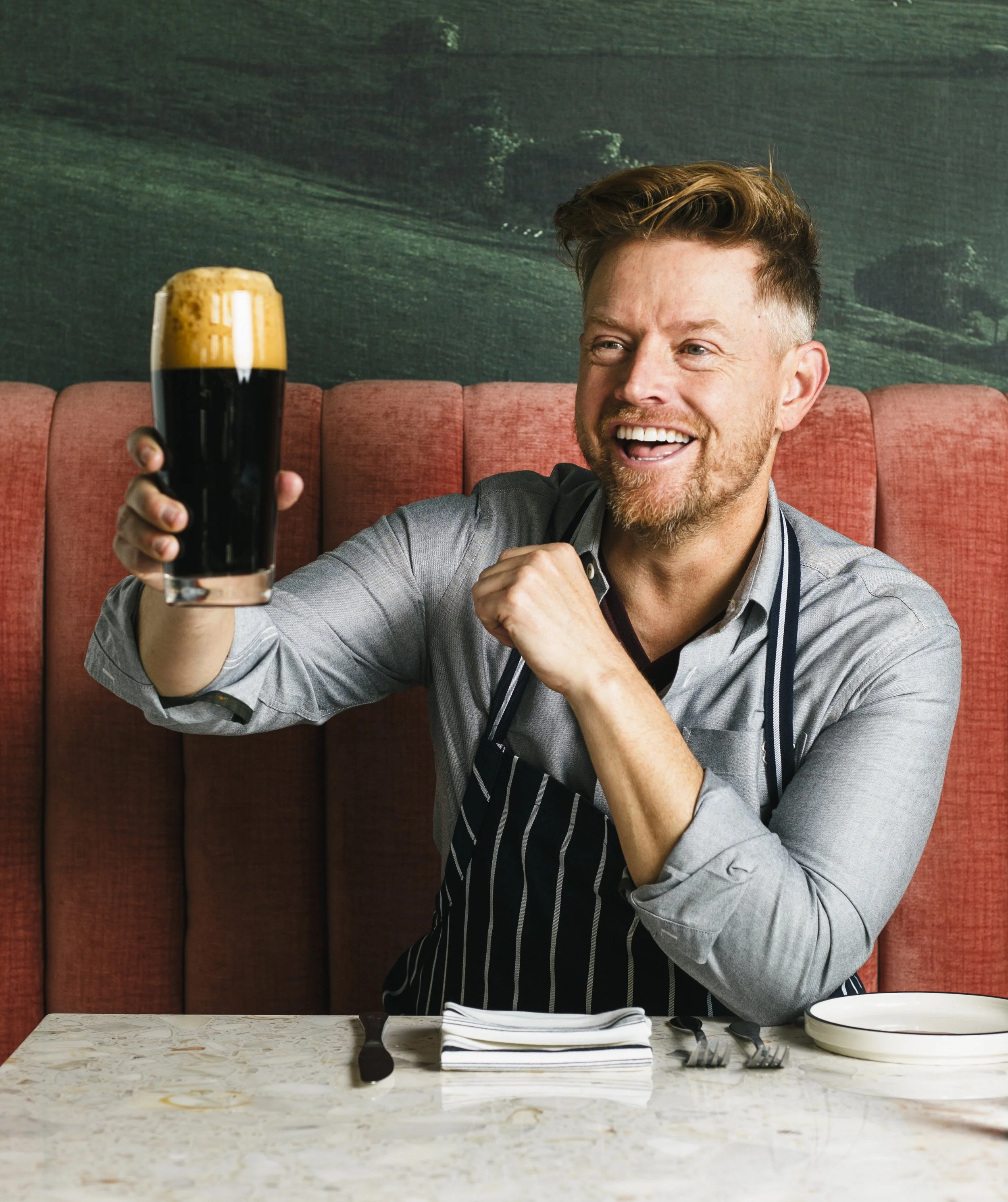Commercial lifestyle portrait of celebrity chef Richard Blais at his restaurant, California English.
