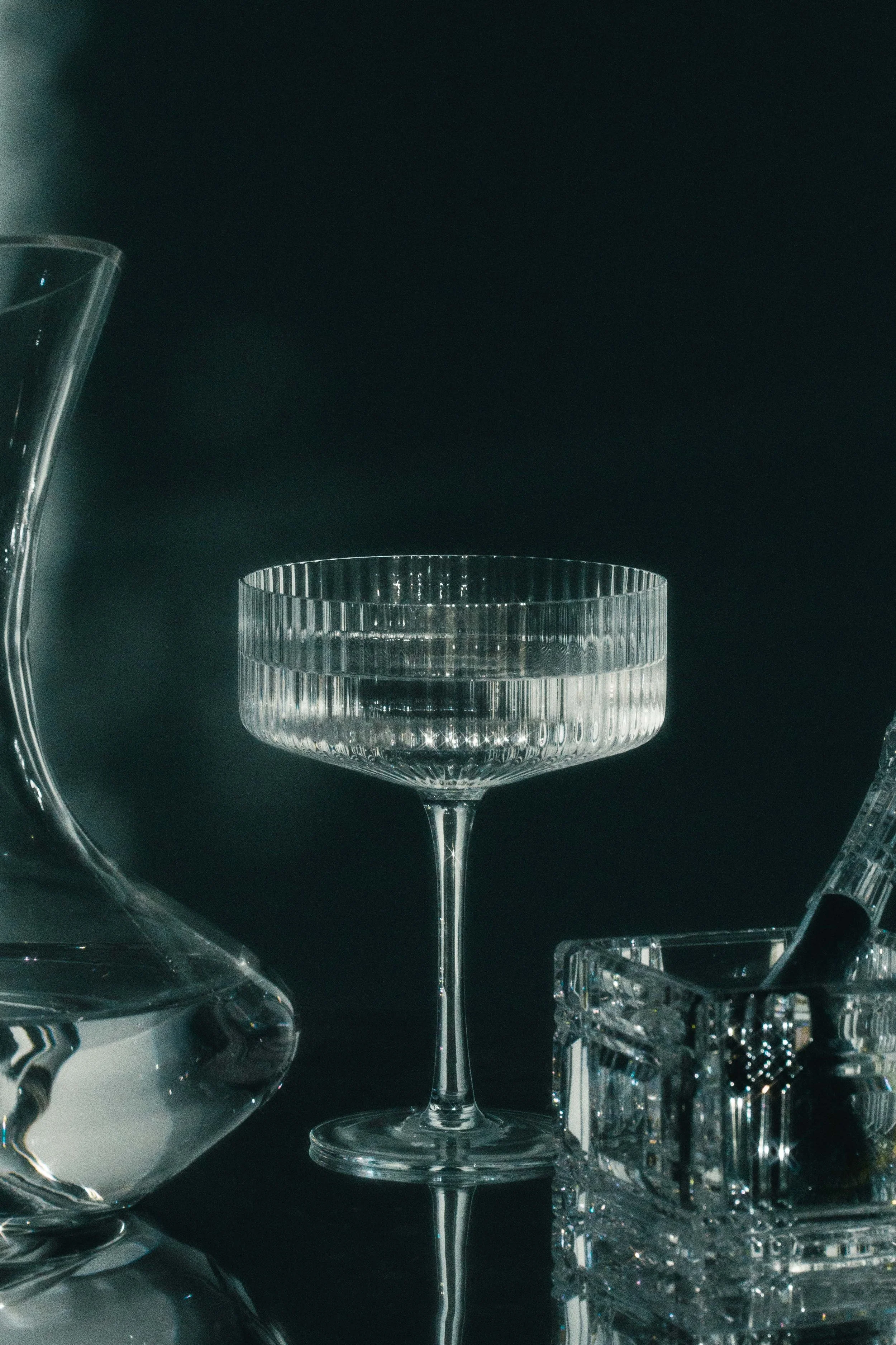 Conceptual still life product photo of glassware in monochrome.