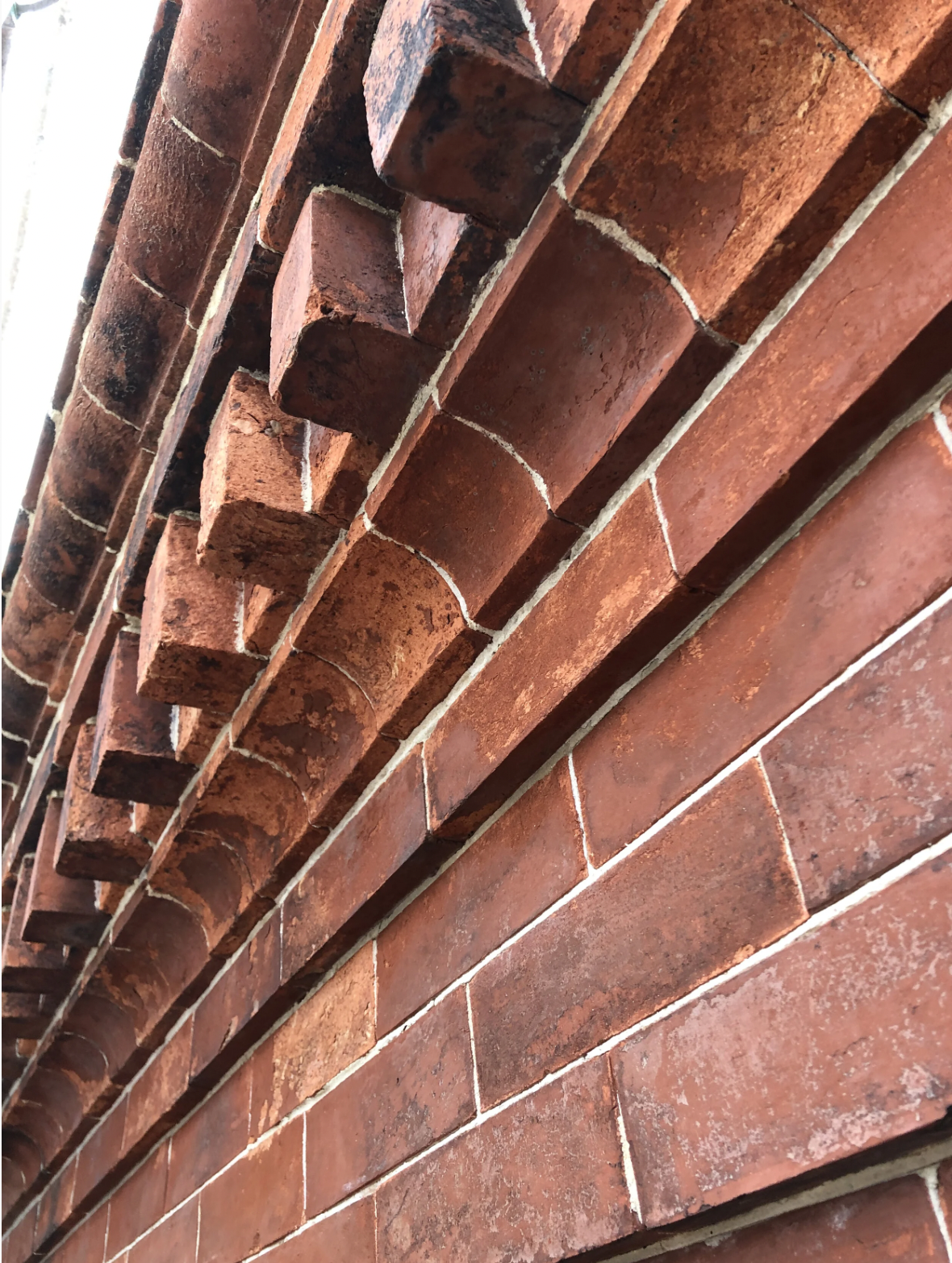 Repointing and brick masonry repair.