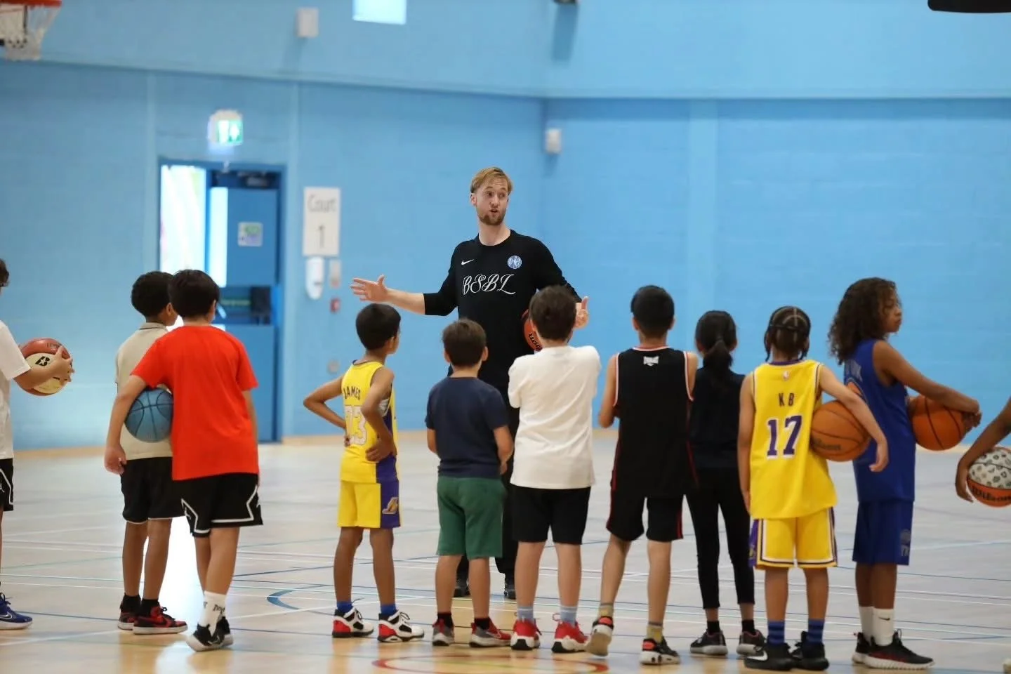 Coach Rob coaching a clinic in England
