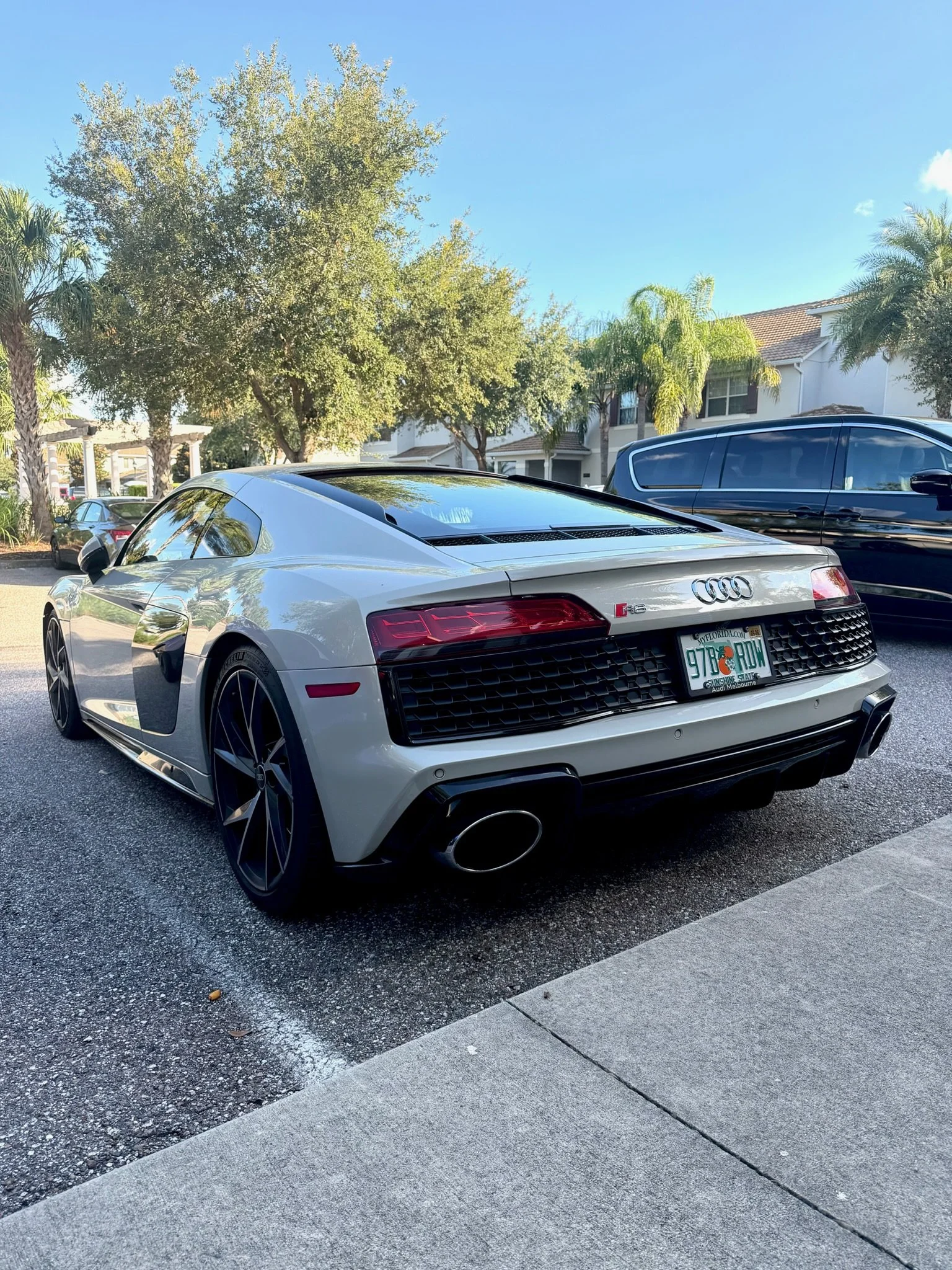 White Audi R8 from rear after exterior detailing.JPG