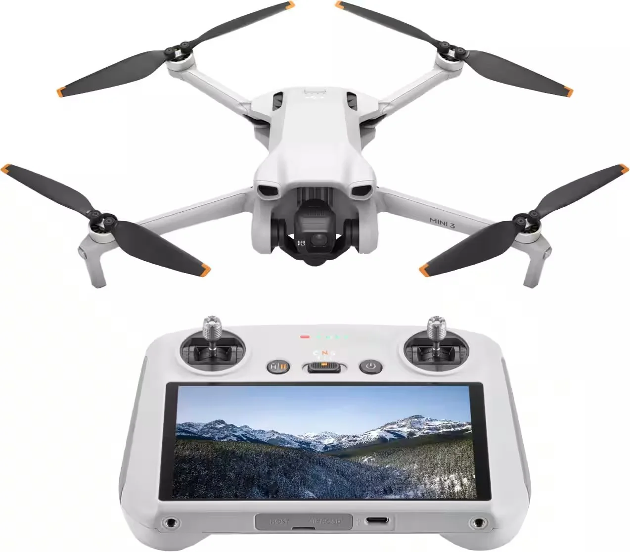 A white drone with four black propellers and a camera on the front, flying above a remote control device with a screen displaying a mountain landscape.