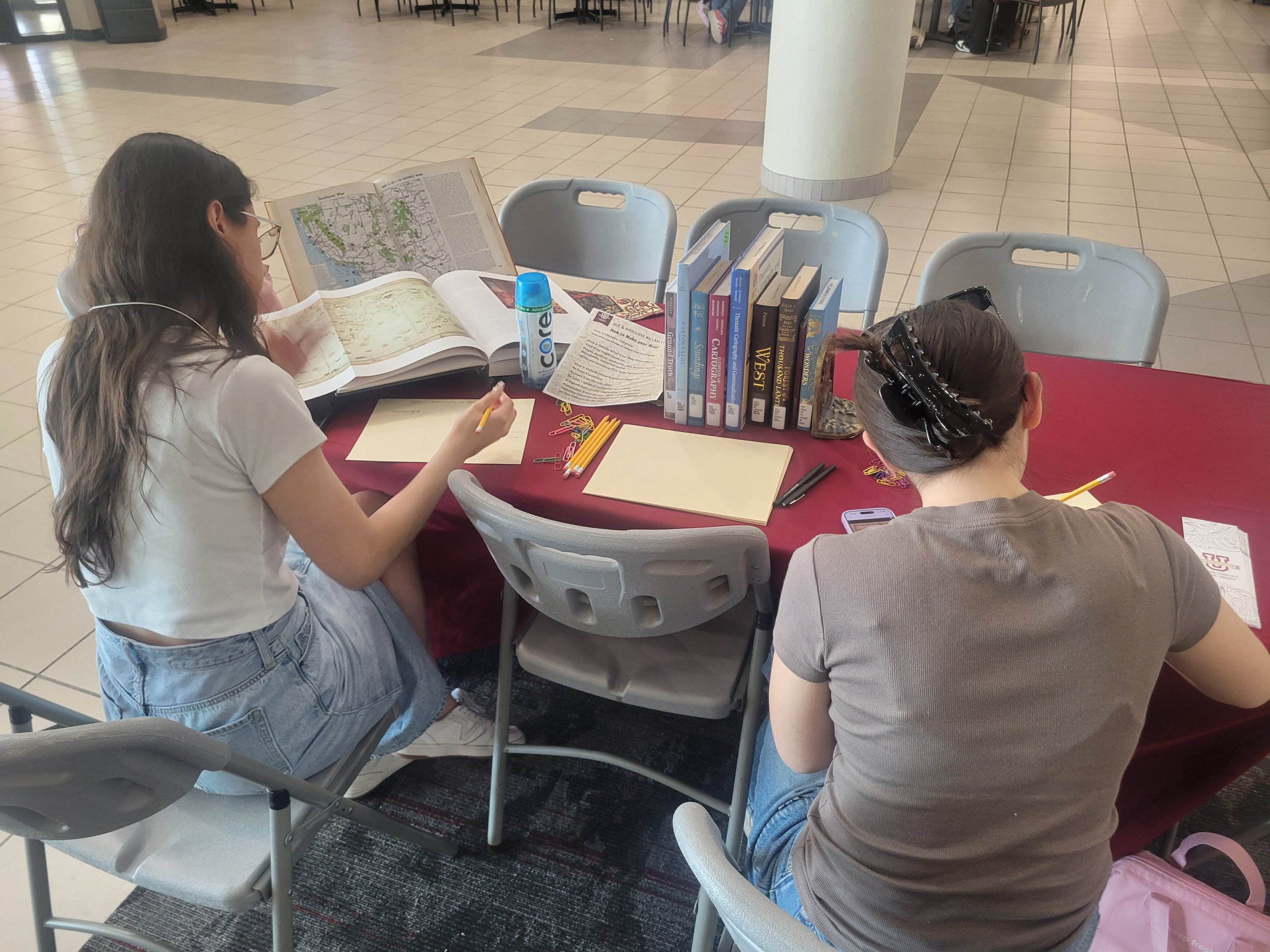 Students engaging with the materials and participating in the event.