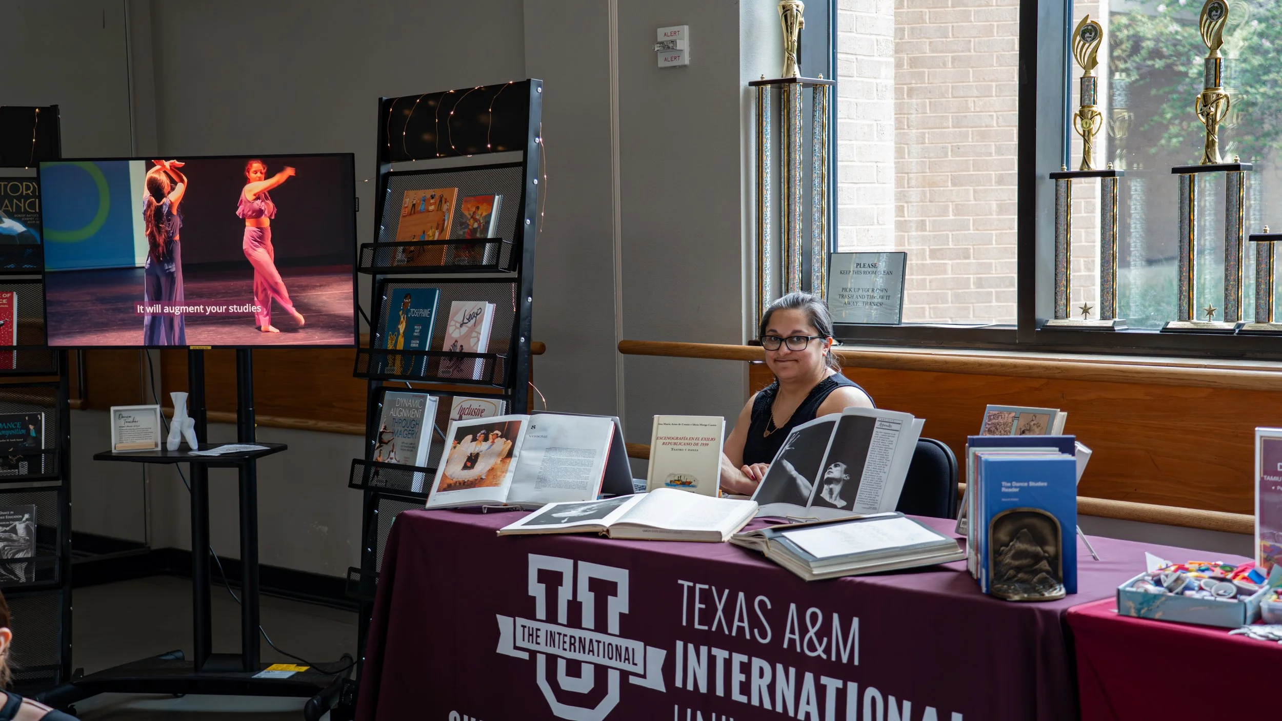 The Outreach librarian managing the event table.