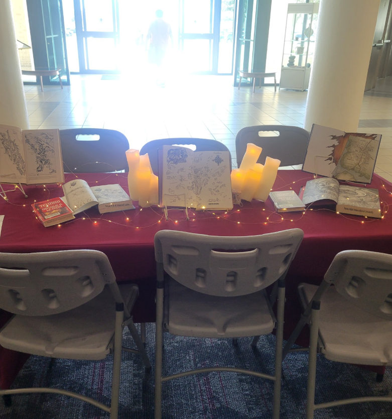 An exhibition of books with decorations for a fairytale themed experience. Many students wanted to sit at this table.