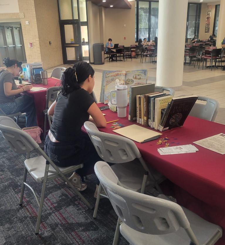 More students engaging with the materials and participating in the event.