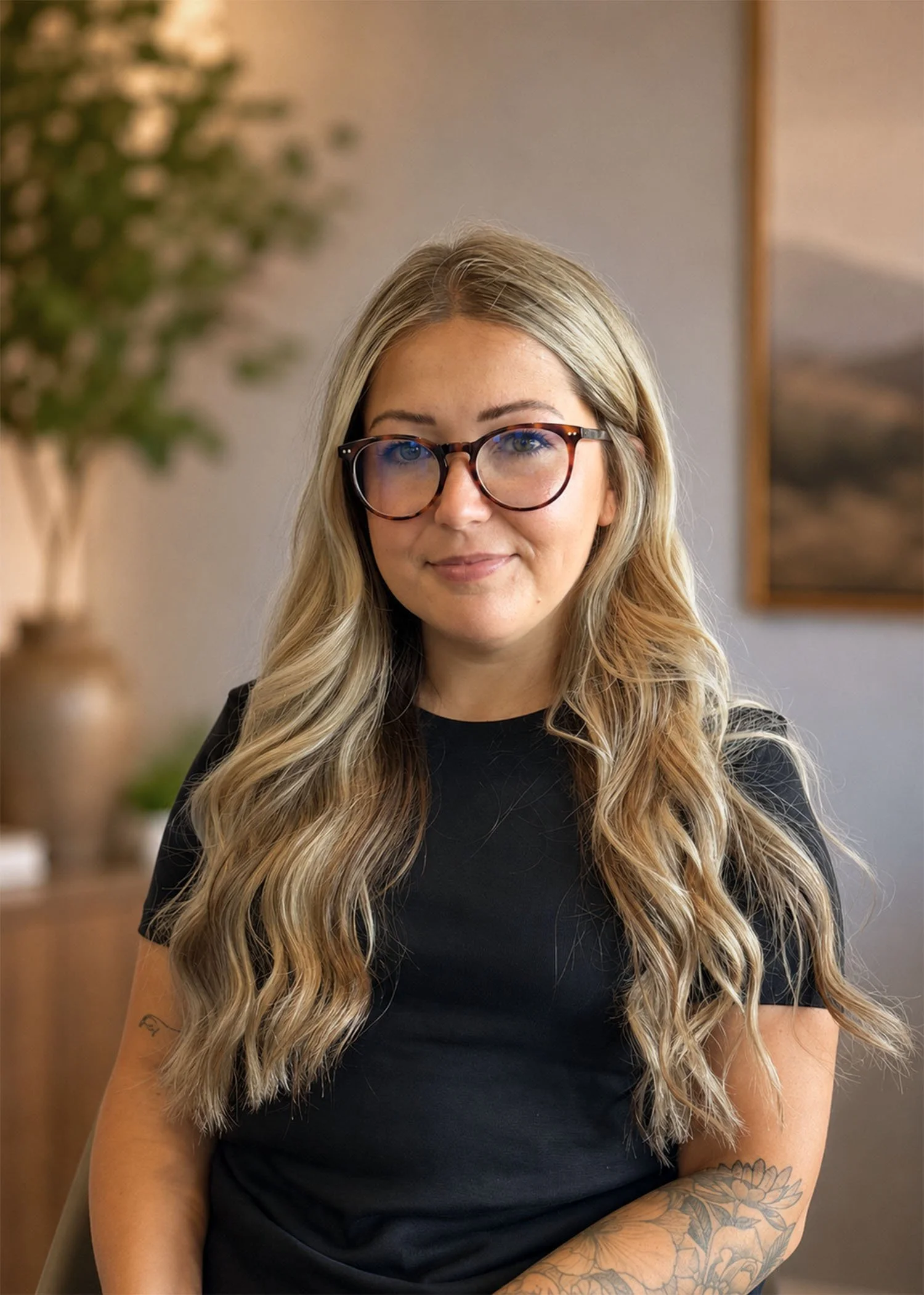Portrait of Sydney Rogers, registered massage therapist at Lakewood Massage & Wellness.