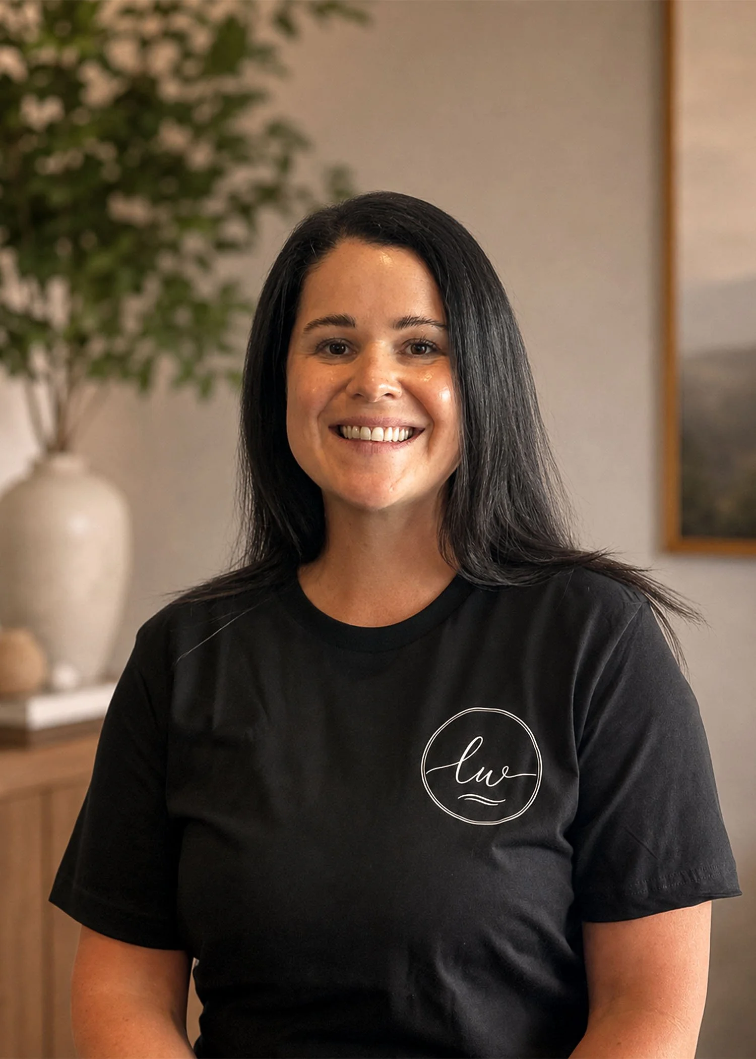 Portrait of Kate Neubauer, registered massage therapist at Lakewood Massage & Wellness.