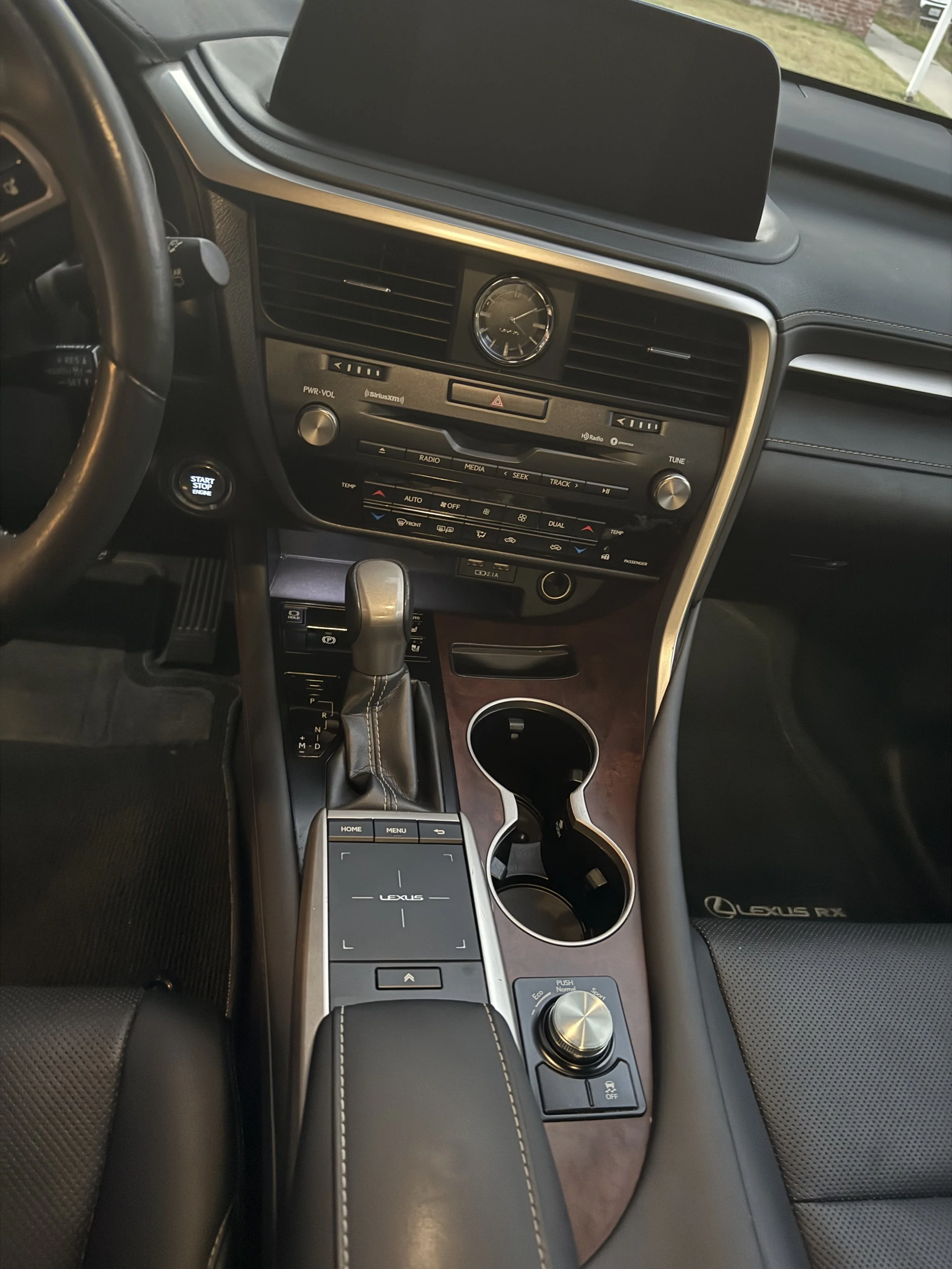 Lexus center console after an Complete Detail