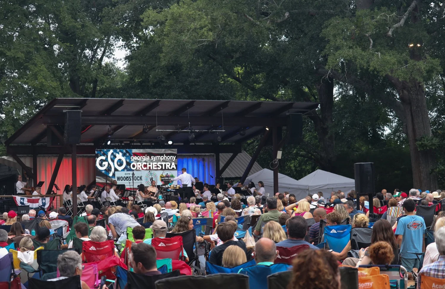 Audience enjoying a live orchestra performance in Woodstock