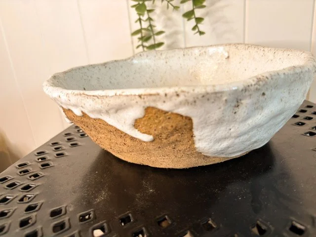 Handmade Rustic White Earth Salad Bowl by Thrown, featuring a white glaze and exposed natural clay for a unique, earthy ceramic serving bowl. close up