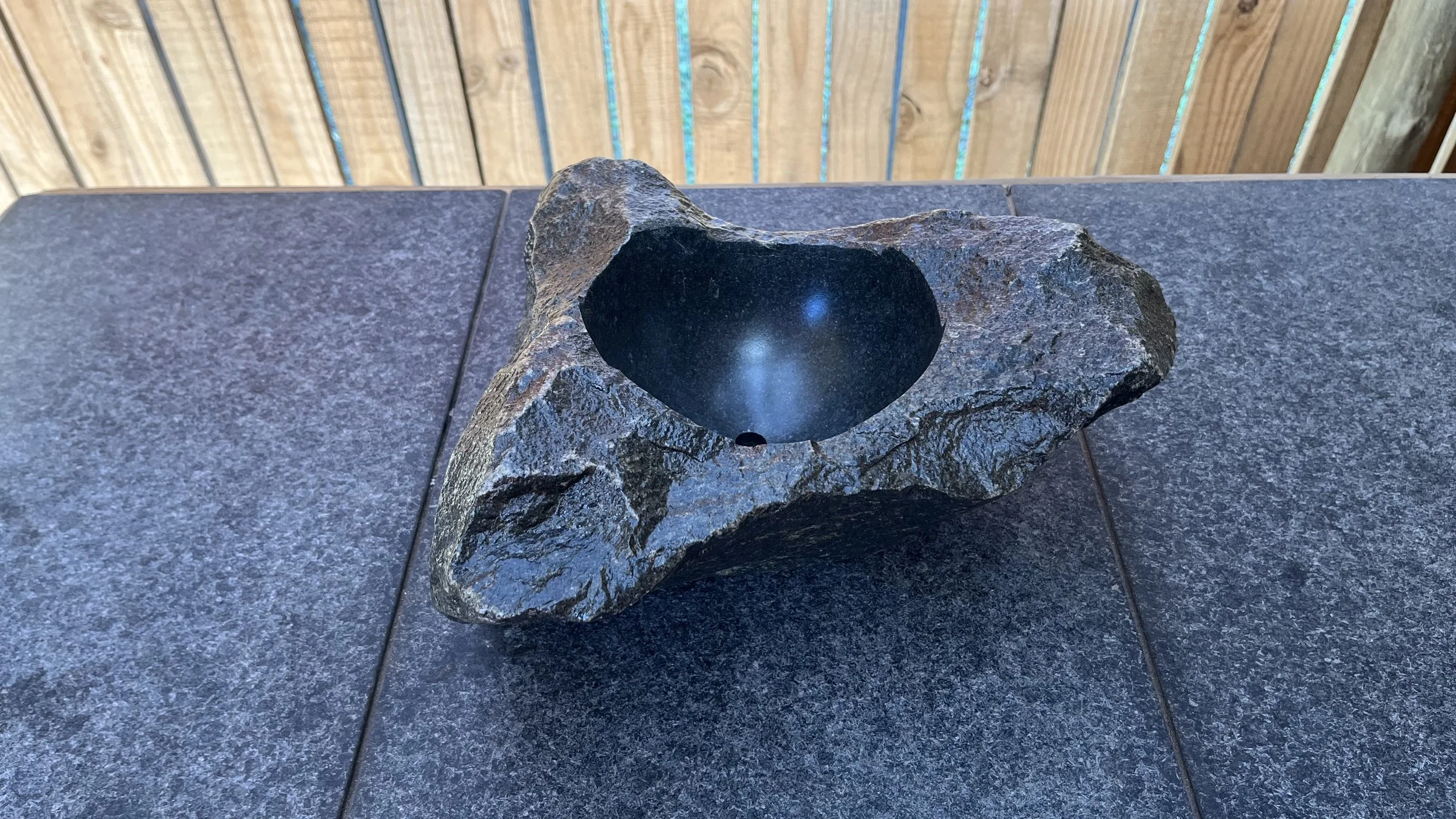 A luxury sculpted stone planter pot. Made with real natural stone.