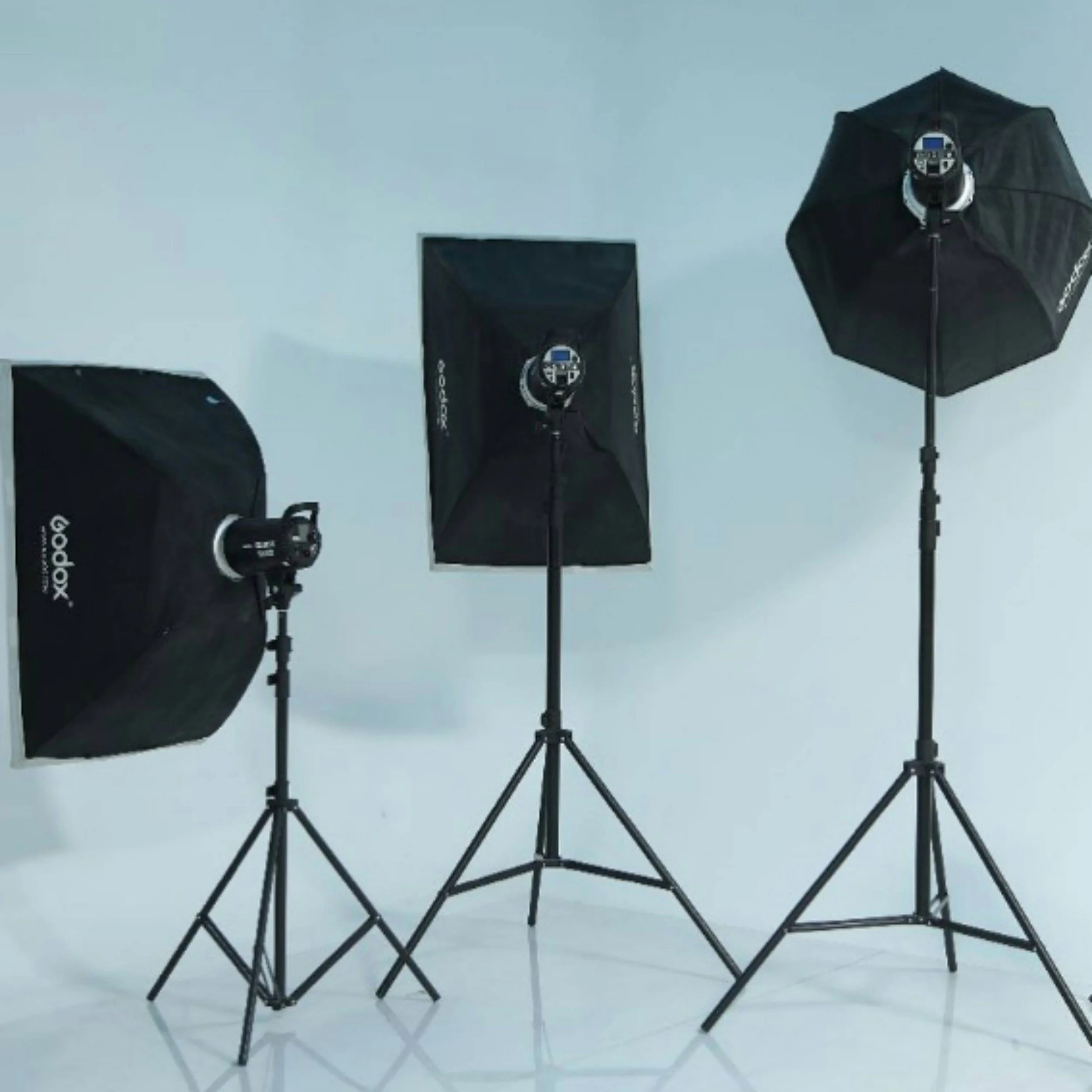 Multiple studio light softboxes on stands offered for additional lighting for picture perfect moments.