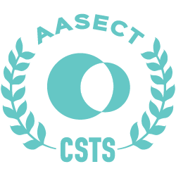 Logo with a large letter 'O' surrounded by laurel branches, with the words 'KIK AASECT' above and 'CSTS' below.