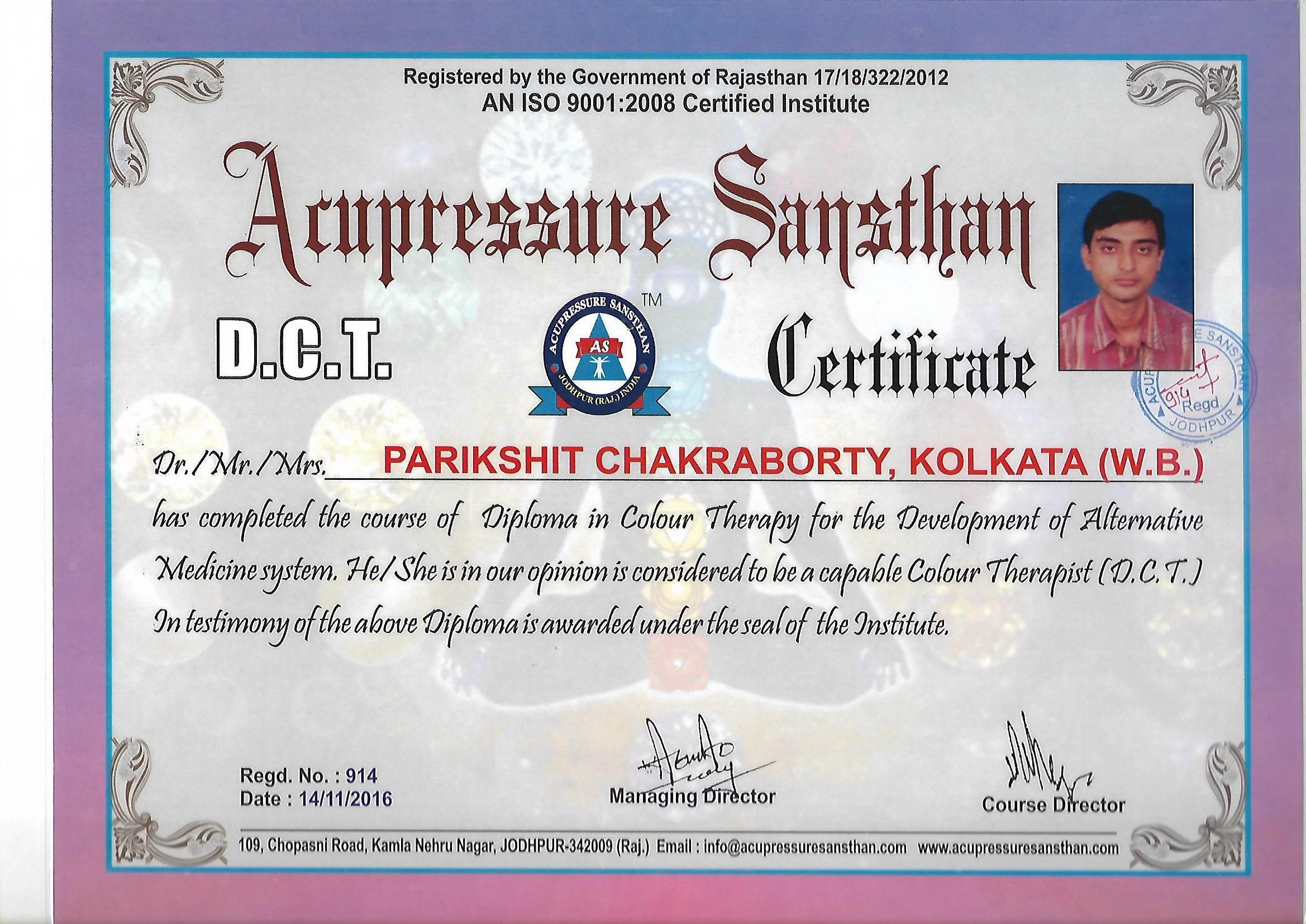 Diploma certificate with the name Parikshit Chakraborty, issued by Acupressure Sansthan in Jodhpur, India, with signatures and a photograph of a young man, dated November 14, 2016.