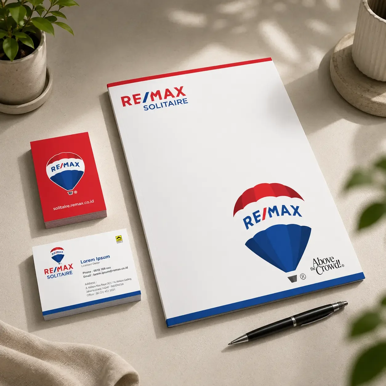 Print Kartu nama dan folder untuk perusahaan properti Remax Solitaire