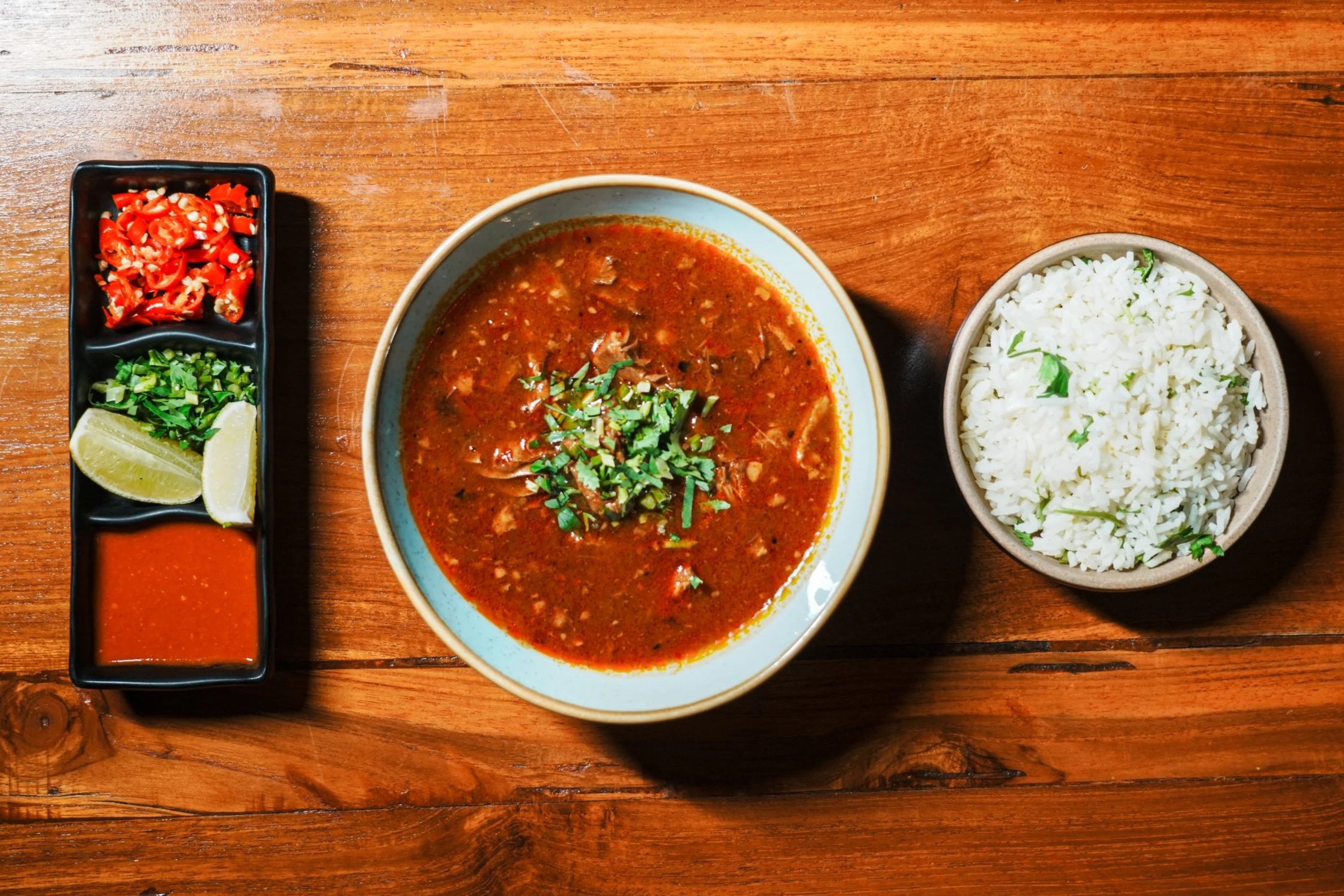 Menudo at Vatos, a Korean-inspired Mexican beef tripe soup served with kimchi and rice