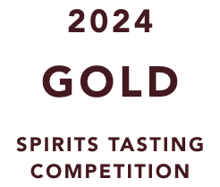Text reading '2024 Gold Spirits Tasting Competition' recognition won by mala mia mezcal among the best mezcal brands