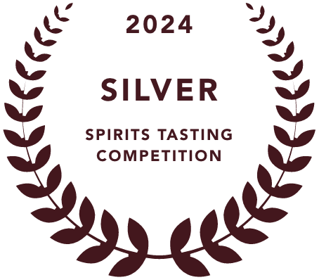 Mala mia mezcal among the best mezcal brands winning the 2024 Silver Spirits Tasting Competition award emblem with laurel wreath design.