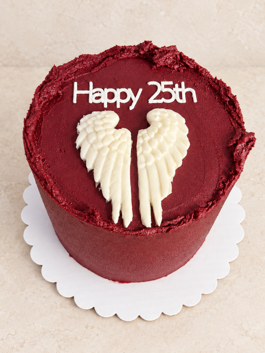 A red bento cake with angel wing design