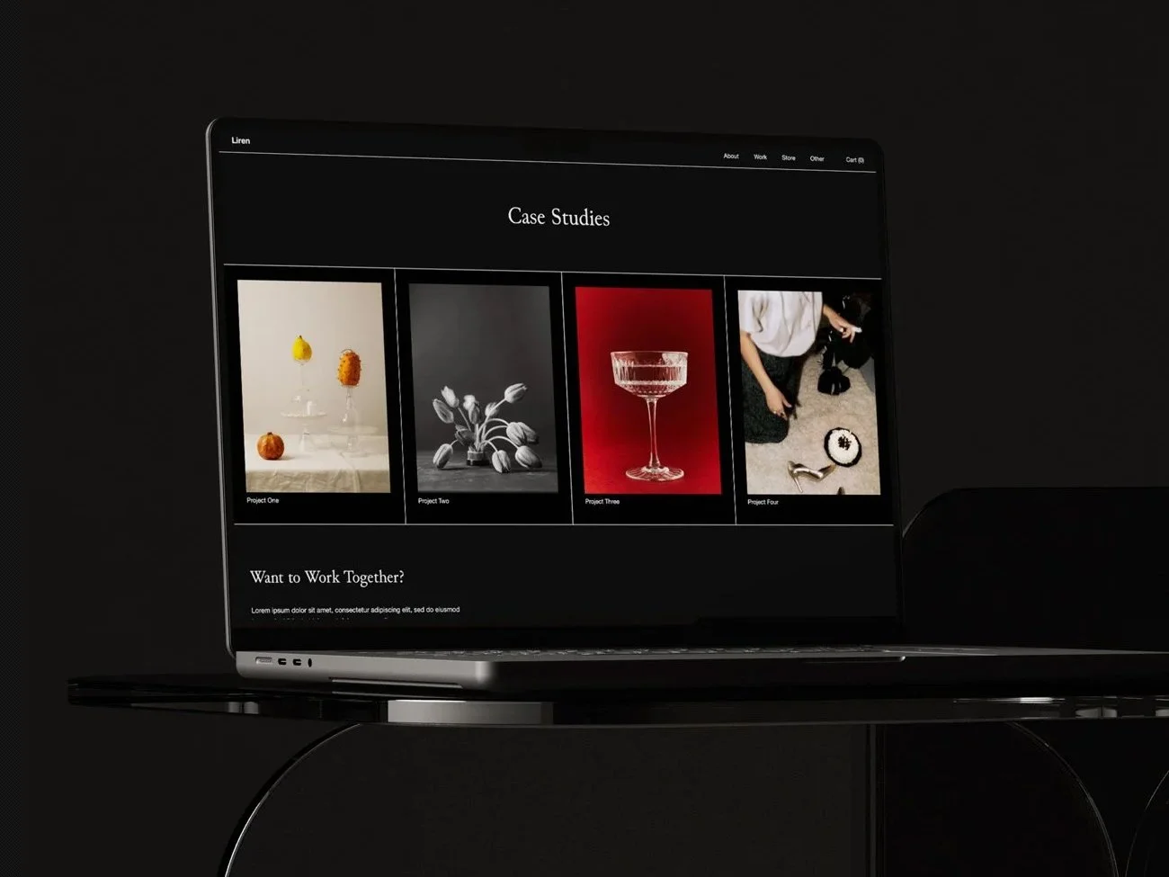 Laptop displaying a website with case studies.