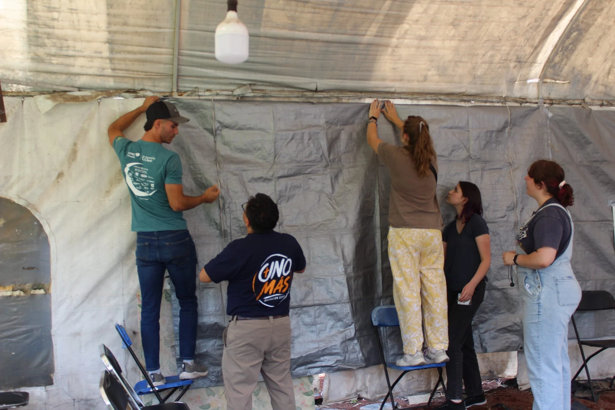 Operation Serve International volunteers preparing the clinic space before serving the community.