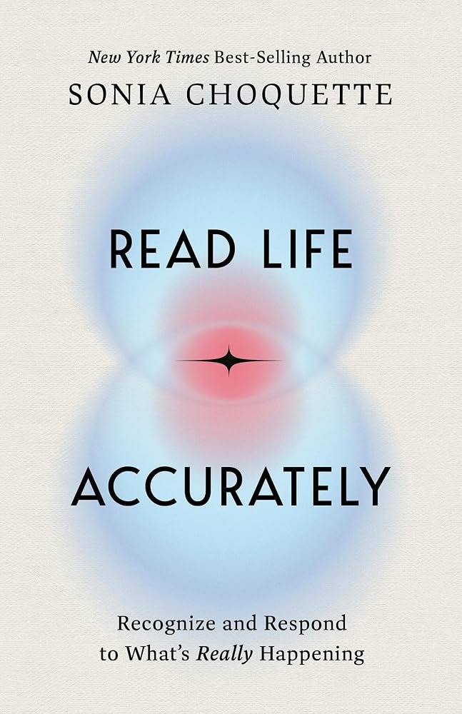 Book cover for 'Read Life Accurately' by Sonia Choquette, with subtitle 'Recognize and Respond to What's Really Happening', featuring abstract blue and red glowing circles with a central star shape.