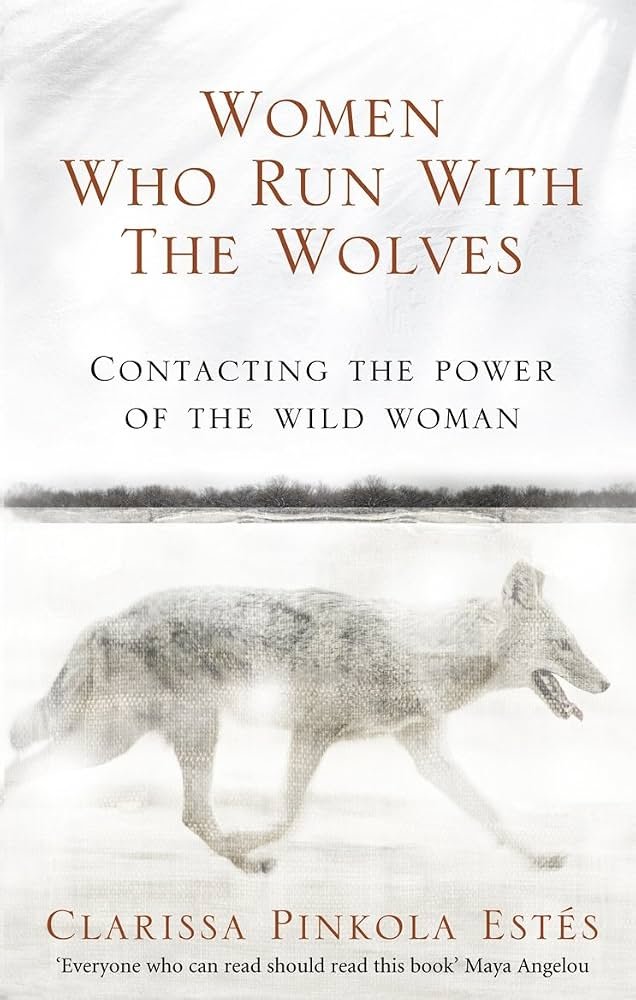 Book cover with the title 'Women Who Run With The Wolves' by Clarissa Pinkola Estés, featuring an image of a running wolf on a snowy landscape.