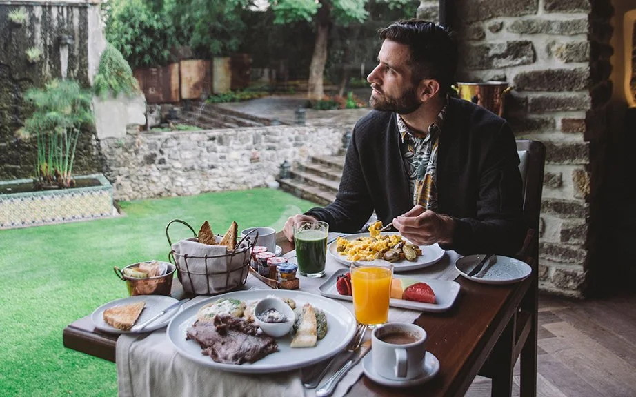 A guest enjoying an elevated dining experience captured for commercial hospitality marketing.
