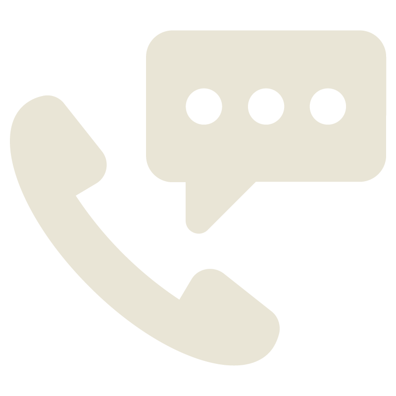 Icon of a telephone handset with a speech bubble containing three dots, representing a phone call or message.