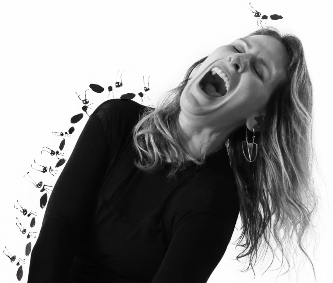 Cindy Derby laughing as whimsical hand-drawn ants surround her.