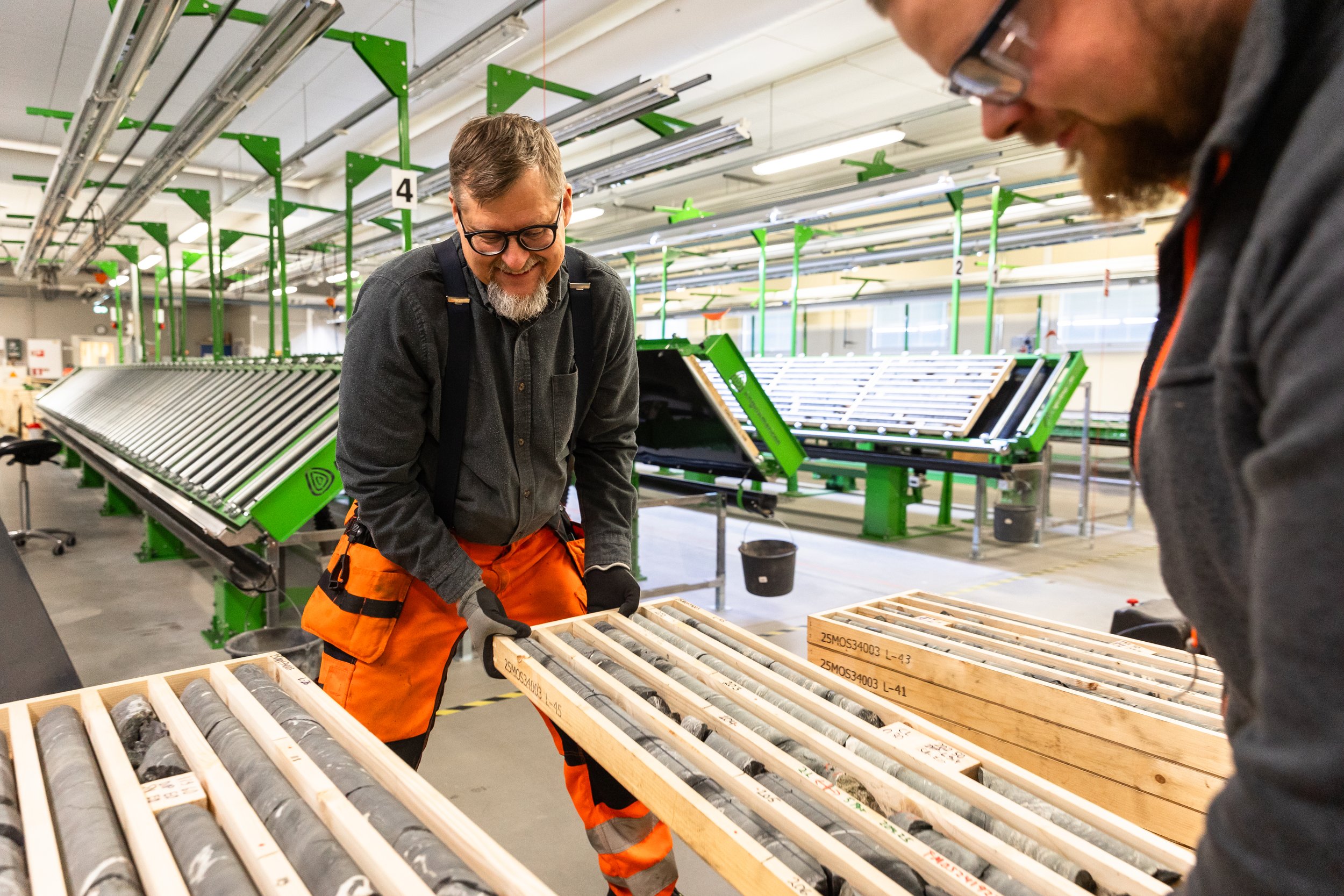    Core Exploration at Sakatti:    Geologists handle drill core samples at Anglo American’s sample handling facility in Sodankylä, Finland. The Sakatti project is a copper and polymetallic deposit designated as a Strategic Project under the European 
