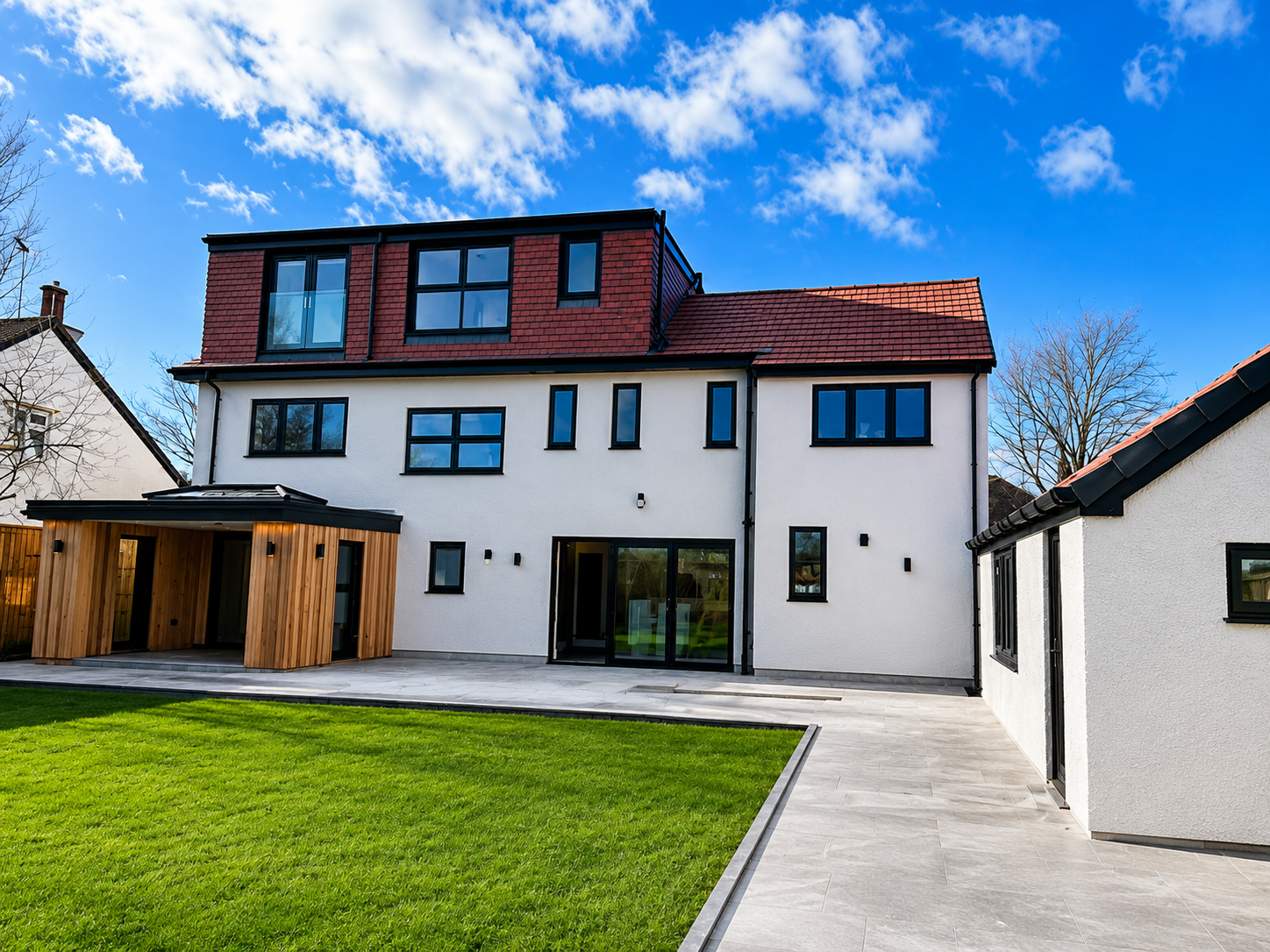 Completed home extension loft conversion and renovation with landscaped garden and patio in Wirral