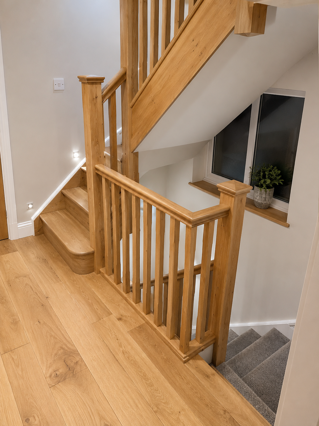 Oak staircase and landing with matching internal oak doors