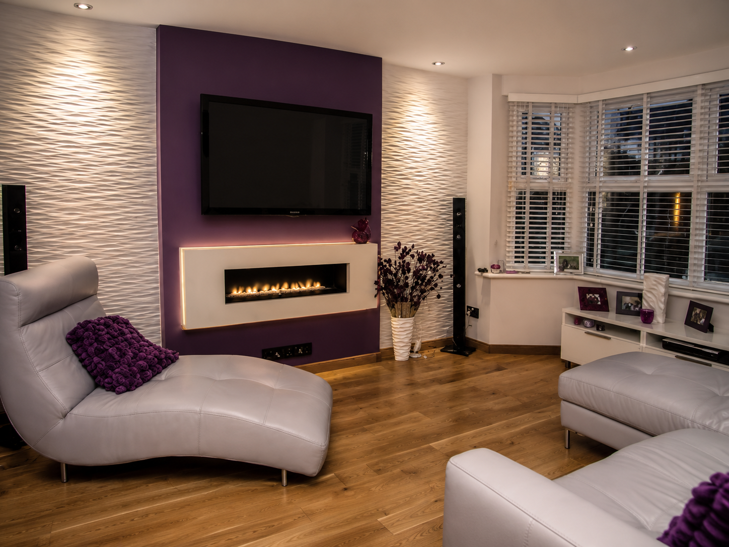 Renovated living room in Wirral with contemporary feature wall and inset fireplace