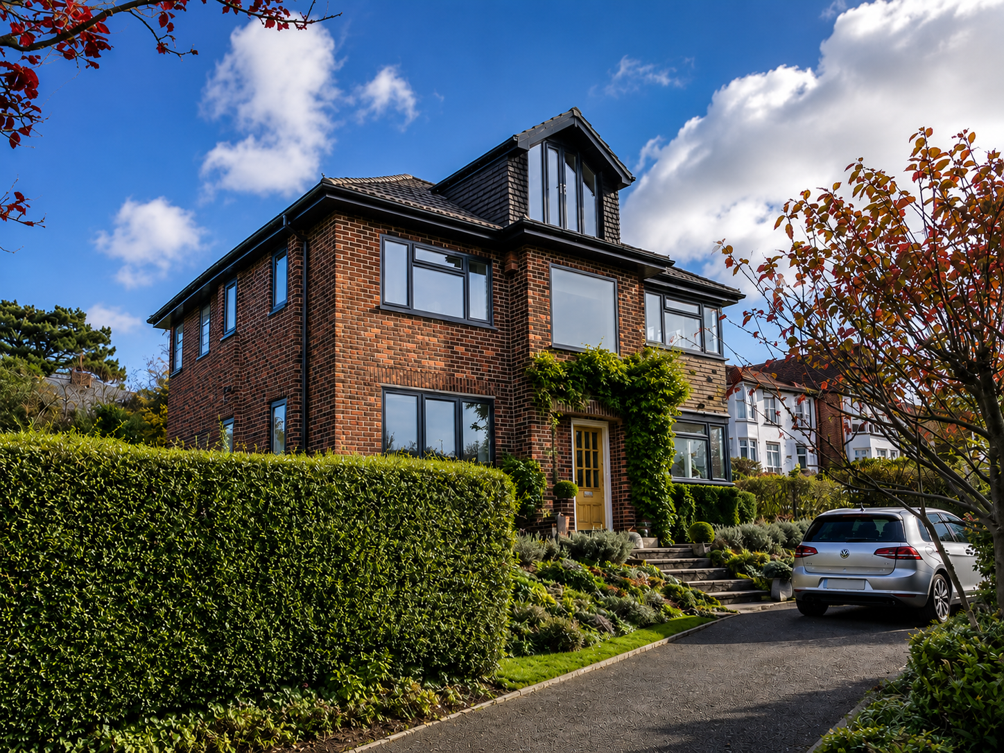 Completed loft conversion to a family home in Wirral with feature roof-level windows