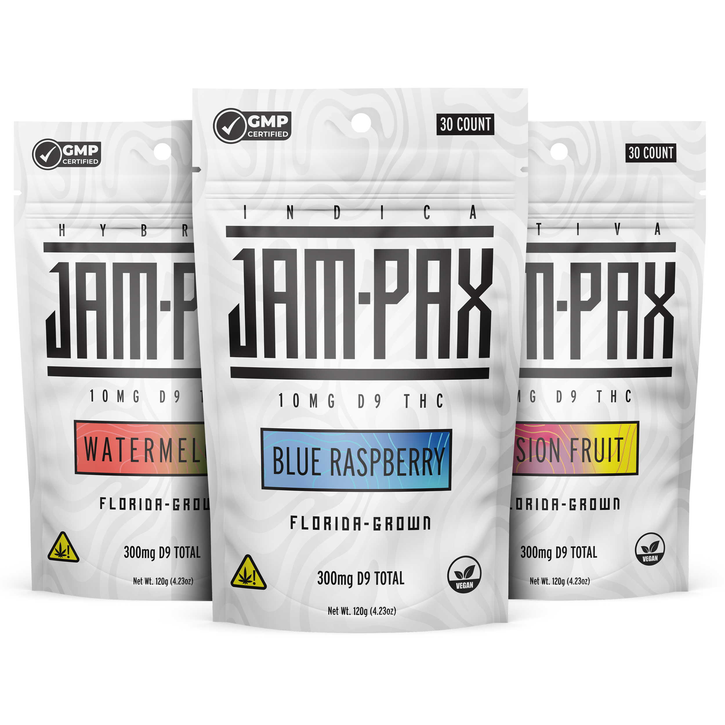 Three sealed packs of cannabis capsules labeled with different flavors: Watermelon, Blue Raspberry, and Sion Fruit, each with a THC content of 300mg and a net weight of 120g, marked as vegan and Florida-grown.