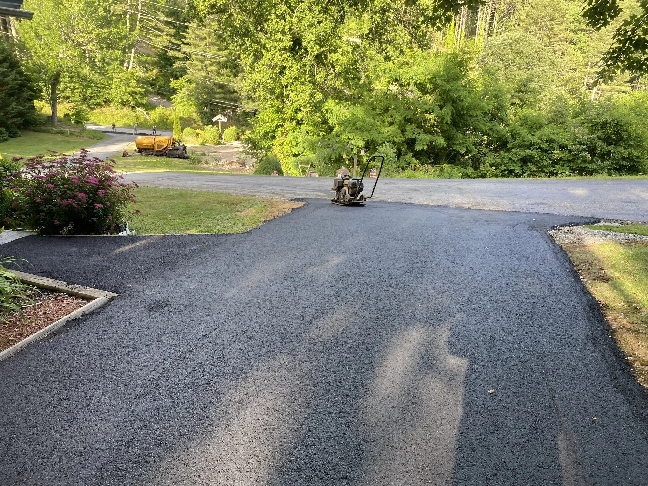 Freshly paved asphalt driveway by Black Bear Paving in Western North Carolina