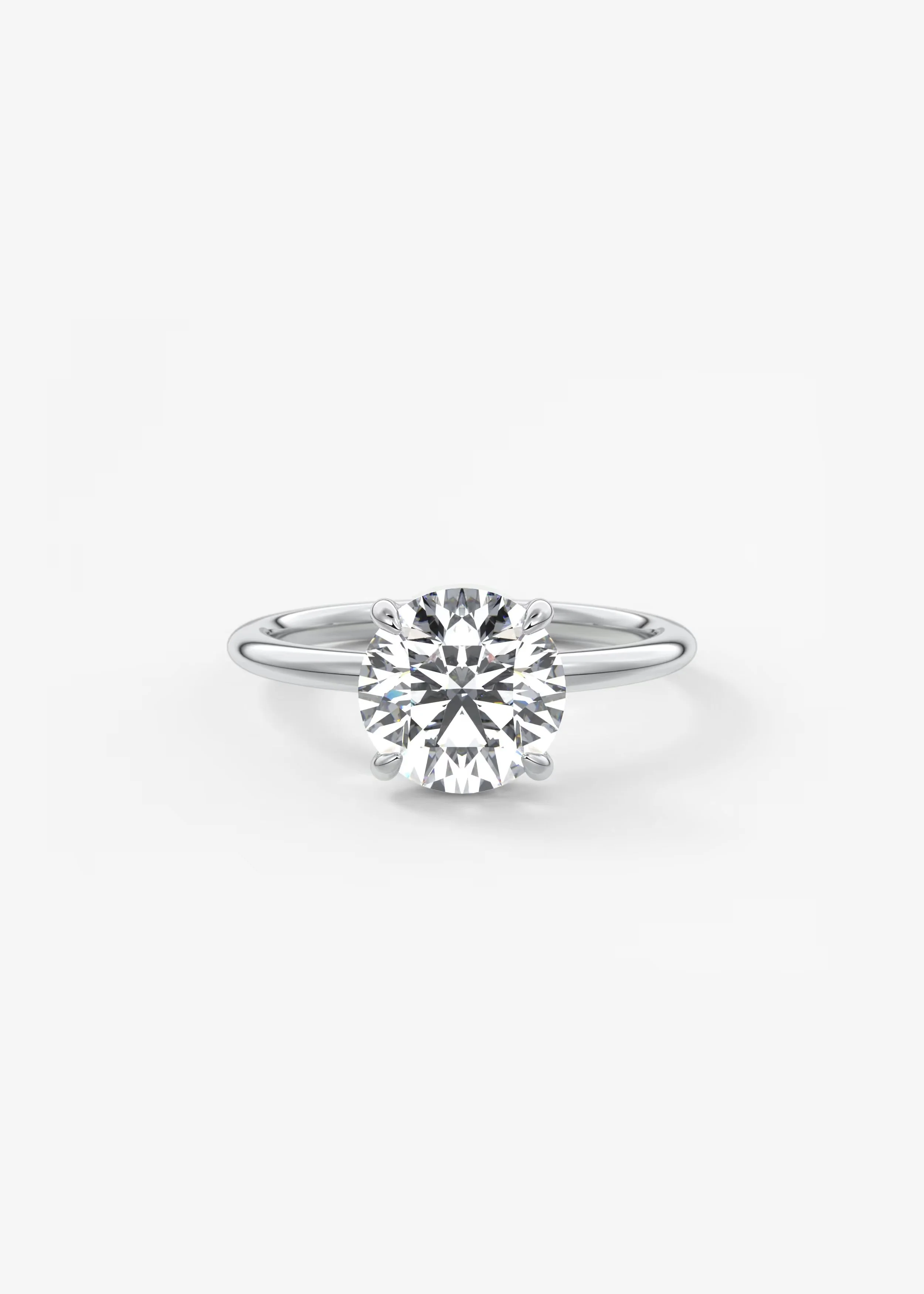 Ein einzelner Solitär-D-saitiger Diamantring in Platinfassung mit einem runden, perfekt geschliffenen Diamanten als Mittelpunkt.