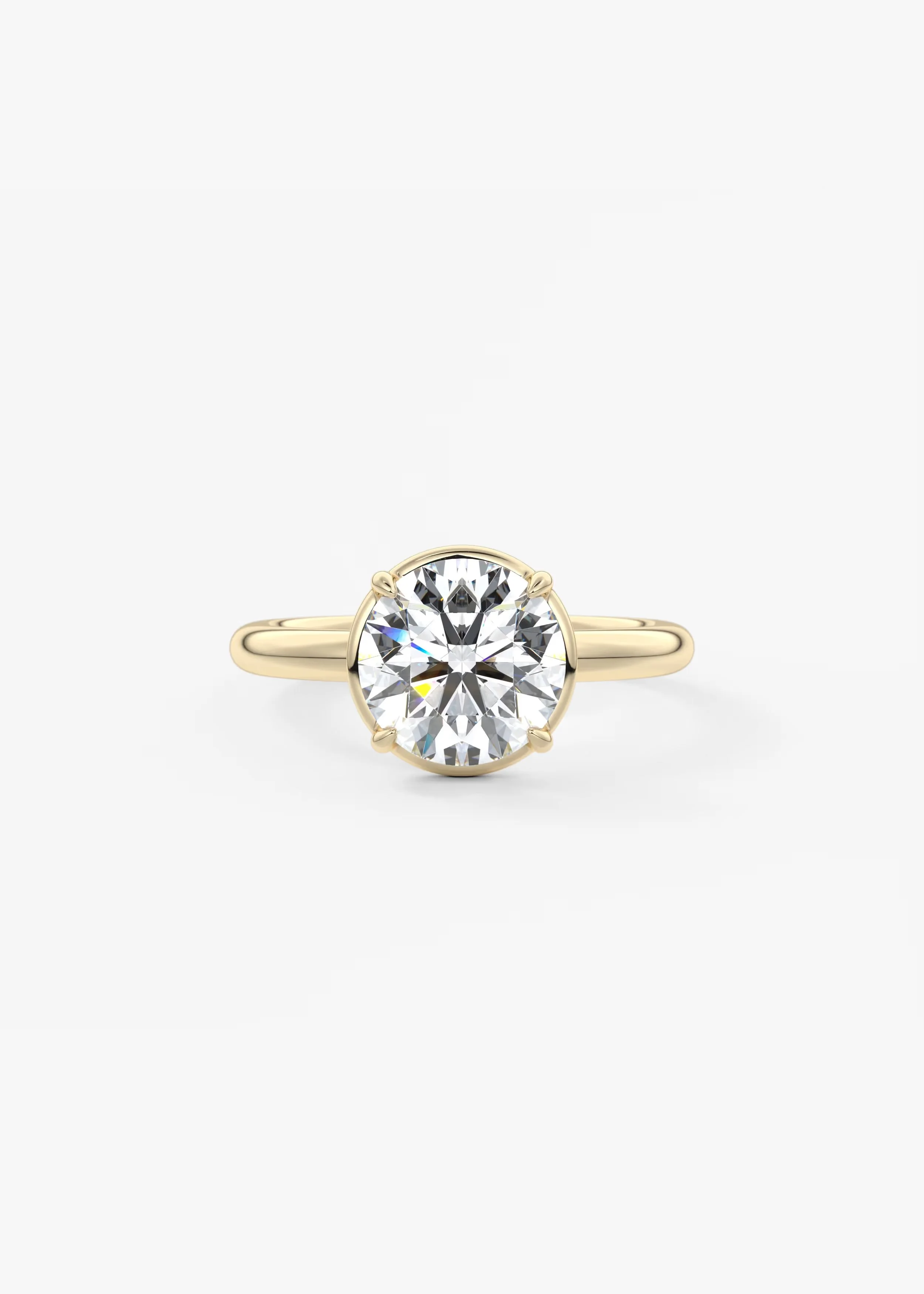 Ein goldener Ring mit einem großen runden Diamanten.