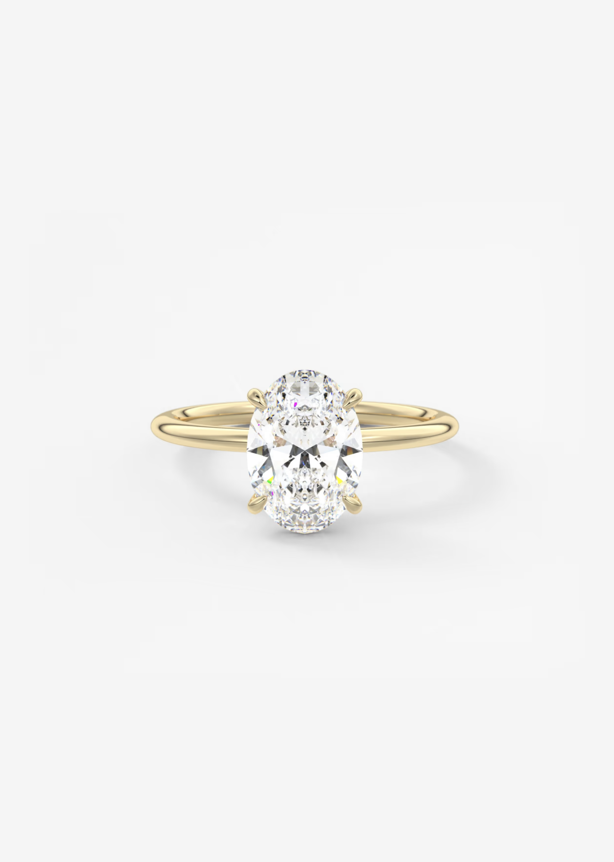 Ein Verlobungsring mit einem großen ovalen Diamanten in einem goldenen Ring.